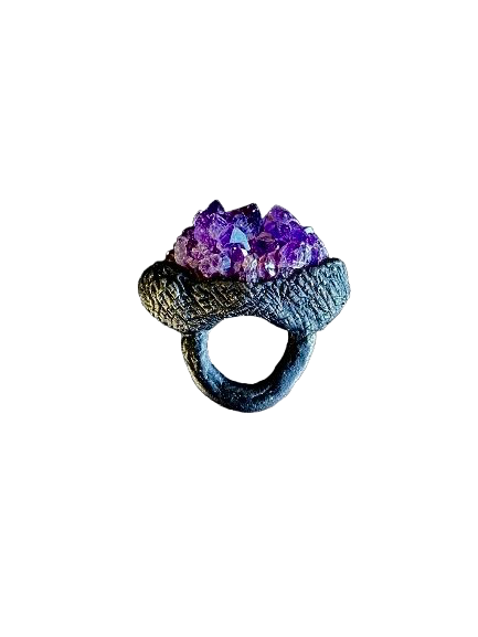 raw amethyst cluster ring in a black sculpted setting